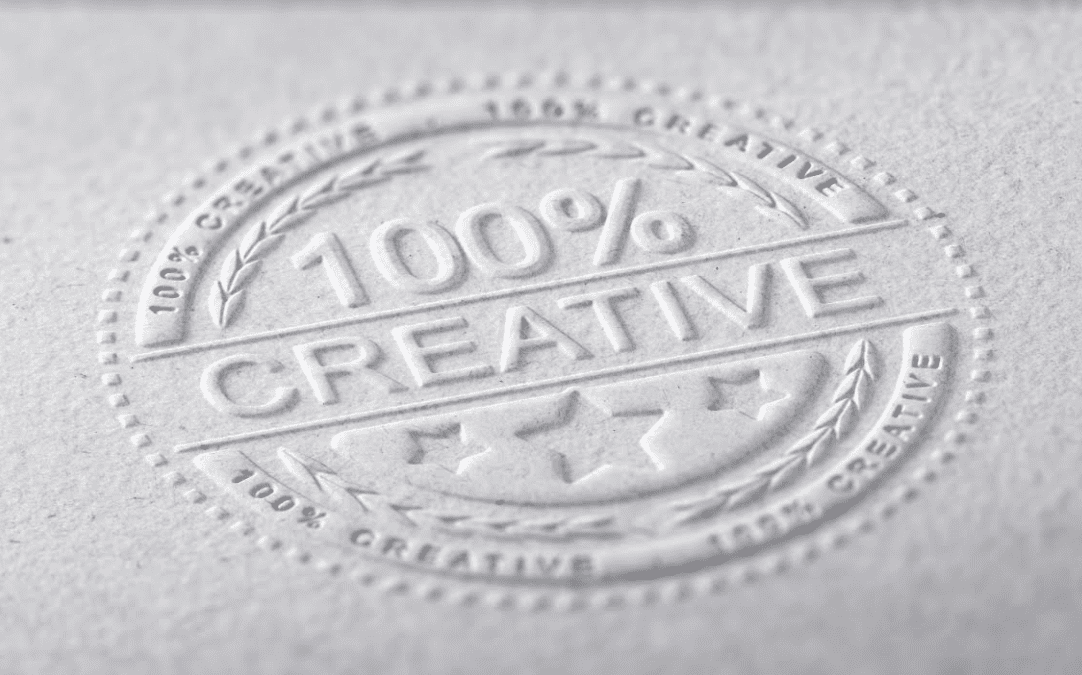 Embossed seal stating '100% Creative', showcasing high-quality, low-cost printing techniques available at Low Cost Printing.